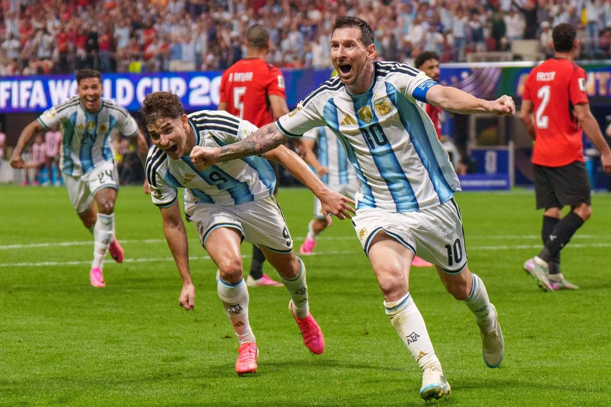 Lionel Messi #10 of Argentina, Julián Álvarez #9 of Argentina and Enzo Fernández #24 of Argentina celebrate