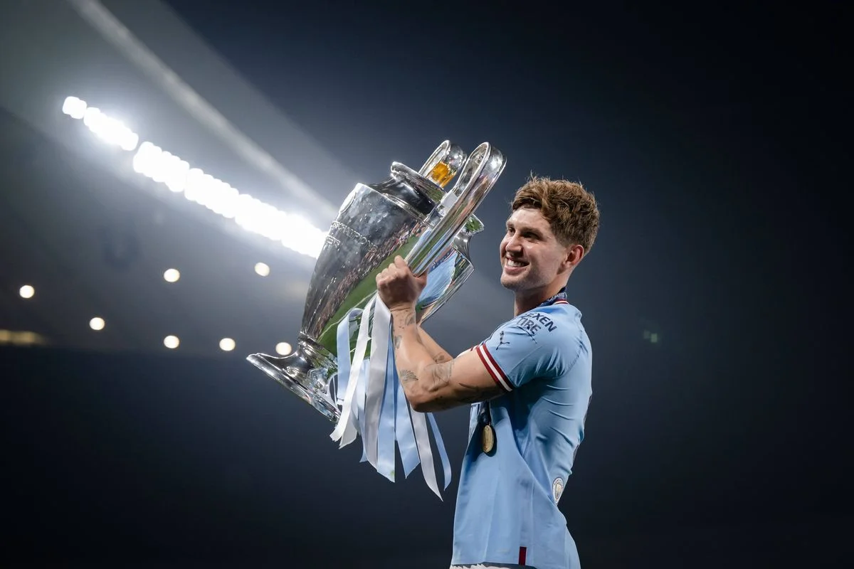 John Stones celebrates after Manchester City won the Champions League in 2023