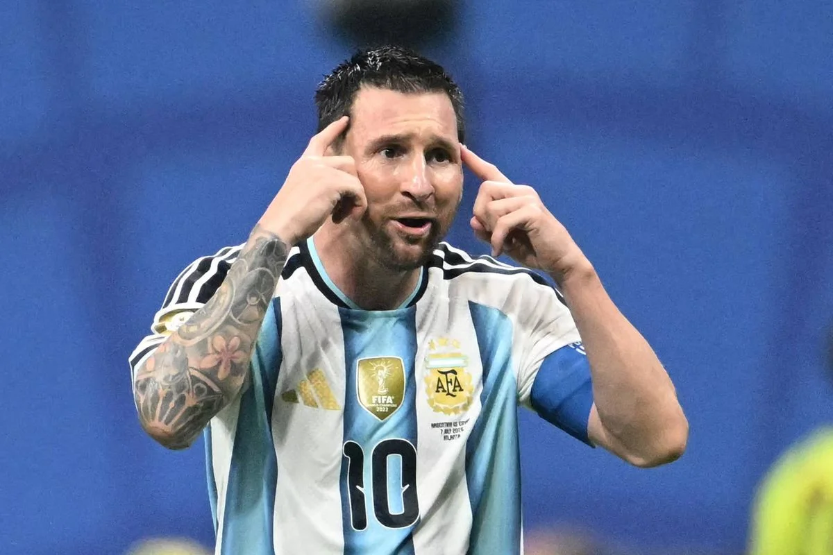 Argentina's forward #10 Lionel Messi celebrates his team's third goal scored by  Argentina's midfielder #24 Enzo Fernandez during the 2026 World Cup round of 16 football match between Argentina and Egypt at Atlanta Stadium in Atlanta on July 7, 2026.  (Photo by ROBERTO SCHMIDT / AFP via Getty Images)
